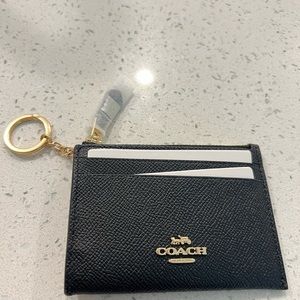 Coach mini leather keyring wallet. Black with gold hardware